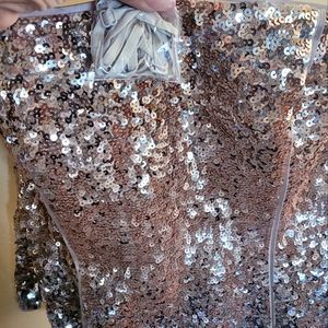 Stunning gold evening top.